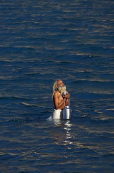 a Holy men and Street Sadhus at the Holy Ganges River in the city of Rishikesh in the Province Uttarakhand in India.  India, Rishikesh, February, 1998