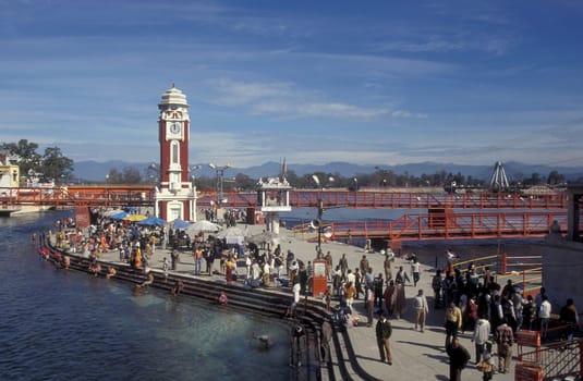 a view over public aerea with the Clock Tower at the Holy Ganges River in the city of Haridwar in the Province Uttarakhand in India.  India, Haridwar, February, 1998