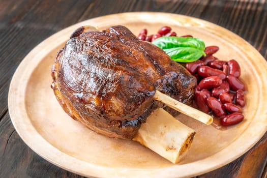 Glazed cooked pork hock with kidney beans