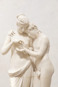 Possagno, Italy - 29 June 2023: Cupid and Psyche statue by sculptor Antonio Canova, 1800. Sensual hug, love and togetherness emotion.