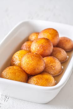 Gulab jamun indian dessert soaked in syrup