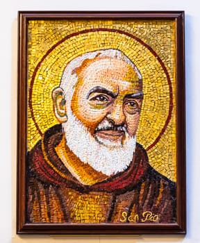 RAVENNA, ITALY - JUNE 12, 2024: the mosaic of Father Pius - Padre Pio -  in the church of Santa Maria Maddalena