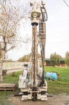Water well drill. Industrial machinery drilling with mining tower. Engineering equipment