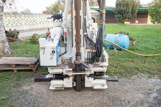 Water well drill. Industrial machinery drilling with mining tower. Engineering equipment
