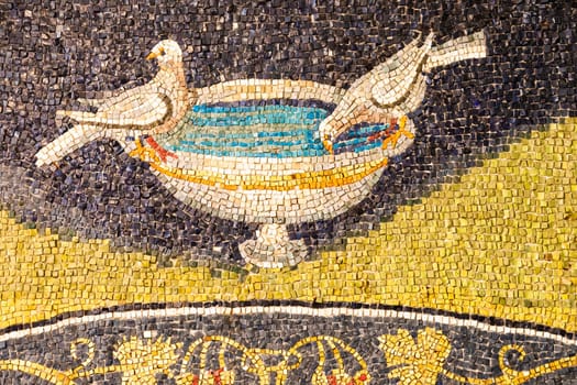 Ravenna, Italy - 12 June 2024, Galla Placidia Mausoleum interior. Ancient mosaic, vintage decoration