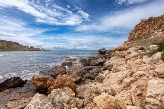 Panoramic view over the Golden Bay and beach (Ghajn Tuffieha) with turquoise, azure sea, Malta travel destination.