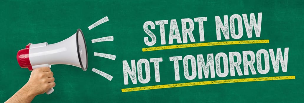 A man holding a megaphone - Start now not tomorrow