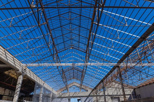 Abandoned warehouse in ruins in Lisbon, harbour area. Portugal