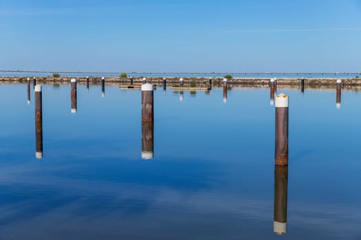 Pier with view on Vasco da Gama bridge on the Tejo river. Lisbon, Portugal.