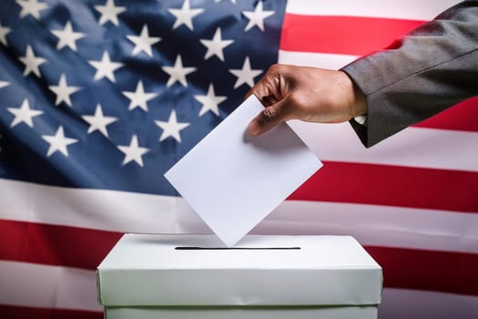 usa elections the hand of man putting vote in the ballot box.
