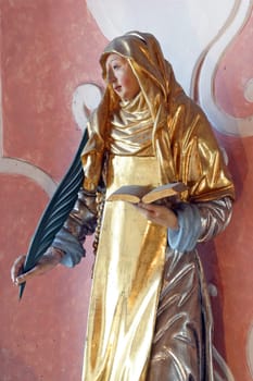 Saint Catherine of Siena, statue on the altar of Saint Apollonia in the Church of Saint Catherine of Alexandria in Zagreb, Croatia