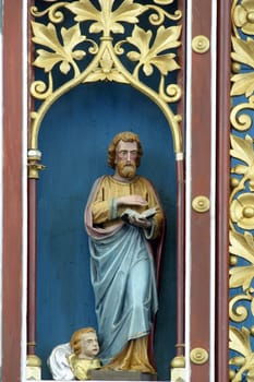 Saint Matthew the Evangelist, statue on the main altar in the parish church of Our Lady of Miracles in Ostarije, Croatia