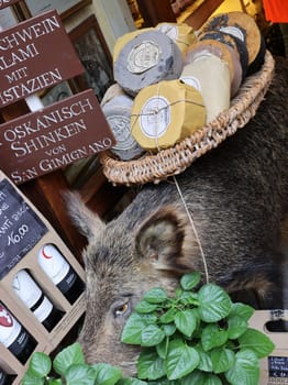 San Gimignano, Italy - Sept 17, 2022: A shop selling local and typical italian produce in the historic center of San Gimignano, Tuscany.