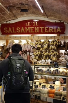 San Gimignano, Italy - Sept 17, 2022: A shop selling local and typical italian produce in the historic center of San Gimignano, Tuscany.