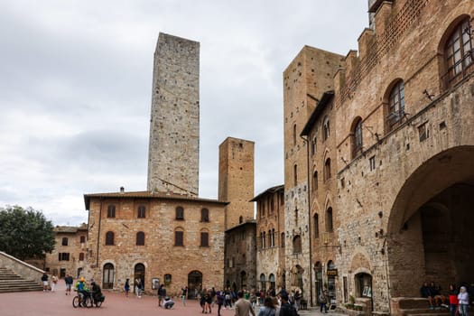 San Gimignano, Italy - Sept 17, 2022: Piazza della Cisterna in San Gimignano, Tuscany, Italy