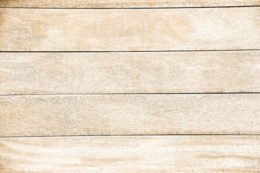 Light-colored wooden boards with a smooth surface and a visible fiber pattern, arranged horizontally, background image