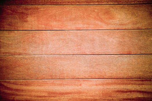Close-up of wooden planks with smooth brown finish, background image