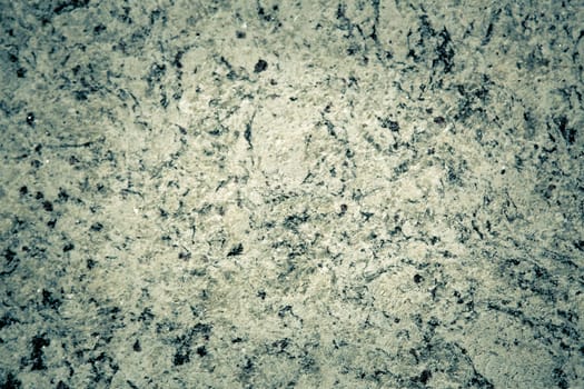 Rough granite texture with gray and black spots, showing a natural rough appearance, background image