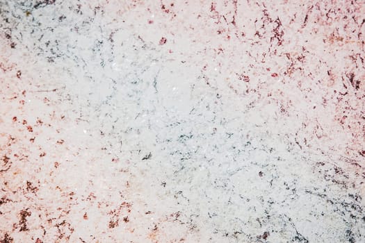 Abstract texture with marble white, red and gray colors on a rough surface, background image