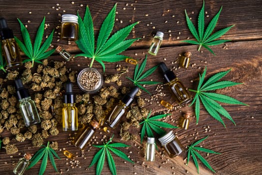 Hemp oil and marijuana leaves on extract cbd