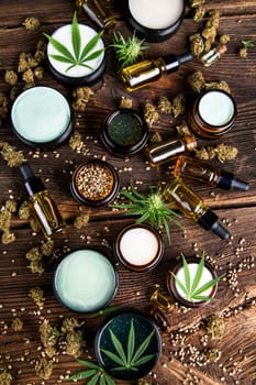 Cbd hemp cosmetics, oil in bottle and marijuana