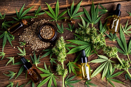 Hemp oil and marijuana leaves on extract cbd