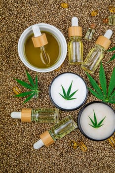 Cbd oil and marijuana plant, hemp seeds, medical marijuana concept