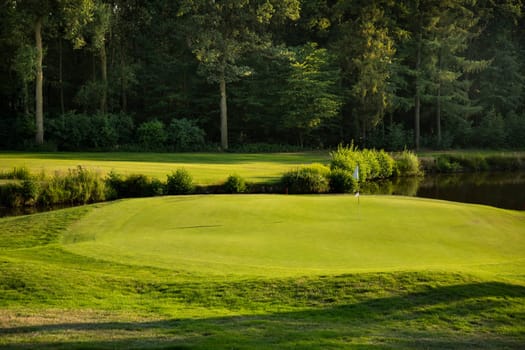 Golf course with green grass