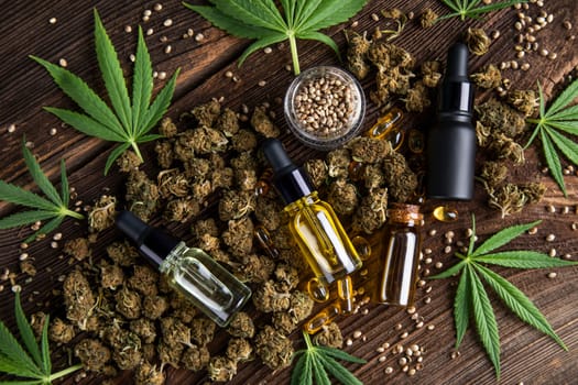 Cbd oil and marijuana plant, hemp seeds, medical marijuana concept