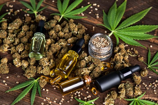 Cbd oil and marijuana plant, hemp seeds, medical marijuana concept