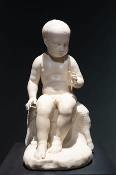 Bassano del Grappa, Italy - 22 December 2023. The Infant St John the Baptis, by sculptor Antonio Canova, 1822, marble