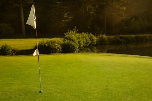 Golf course with green grass