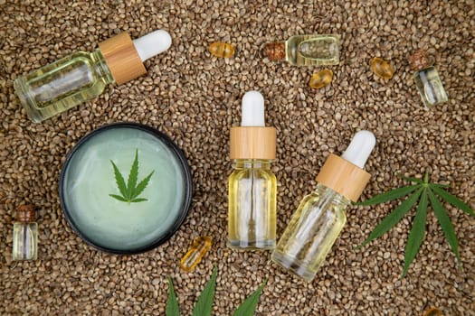 Cbd oil and marijuana plant, hemp seeds, medical marijuana concept