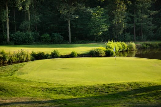 Golf course with green grass