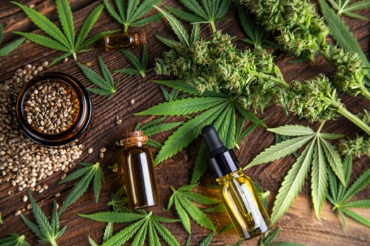 Cbd oil and marijuana plant, hemp seeds, medical marijuana concept