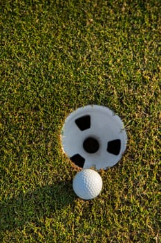 Close up of golf ball on green grass, Sport and lifestyle