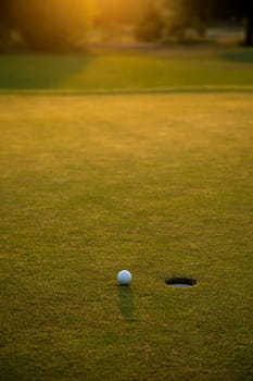 Close up of golf ball on green grass, Sport and lifestyle