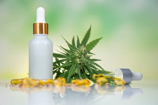 Bottles with hemp oil and cannabis leaves, marijuana
