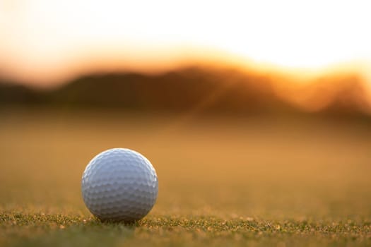 Golf ball, course on a sunny day