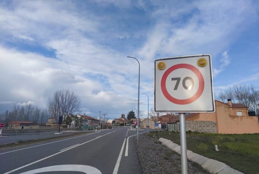 Spanish National N-502 70km/h speed limit road sign. Crossing Solosancho, Avila