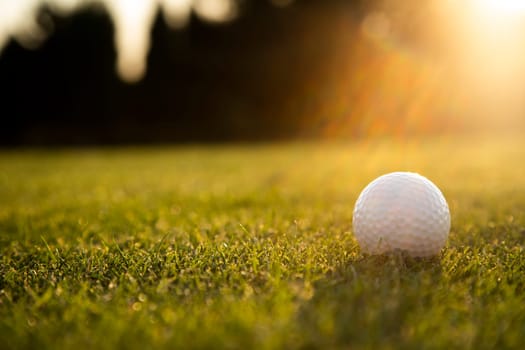 Golf ball, course on a sunny day