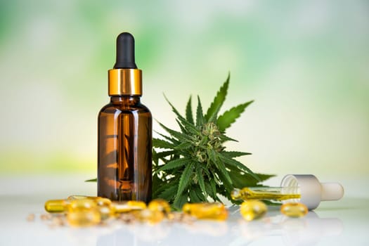 Bottles with hemp oil and cannabis leaves, marijuana