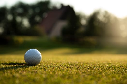 Golf course with ball and grass