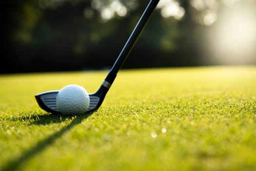 Playing a golf on a beautiful sunset in the evening