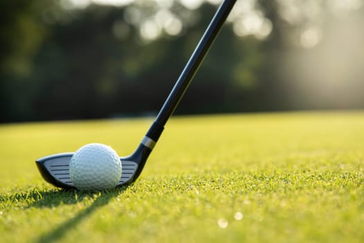 Playing a golf on a beautiful sunset in the evening
