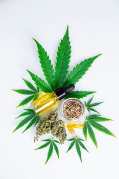 Bottles with hemp oil and cannabis leaves, marijuana