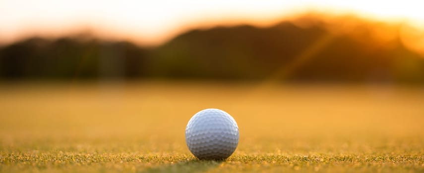 Golf course with ball and grass