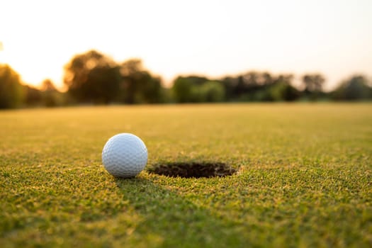 Golf course with ball and grass