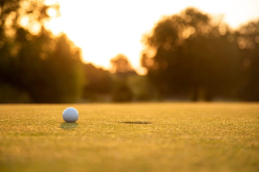 Golf course with ball and grass