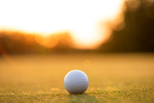 Golf ball, course on a sunny day